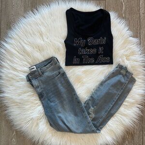 2K Graphic Tank Top and Blue Jeans